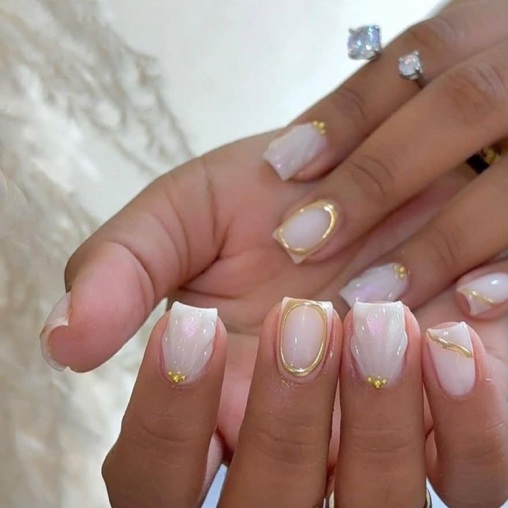 Dip Manicure + Tips at Blooming Beauty Salon in Britt, IA