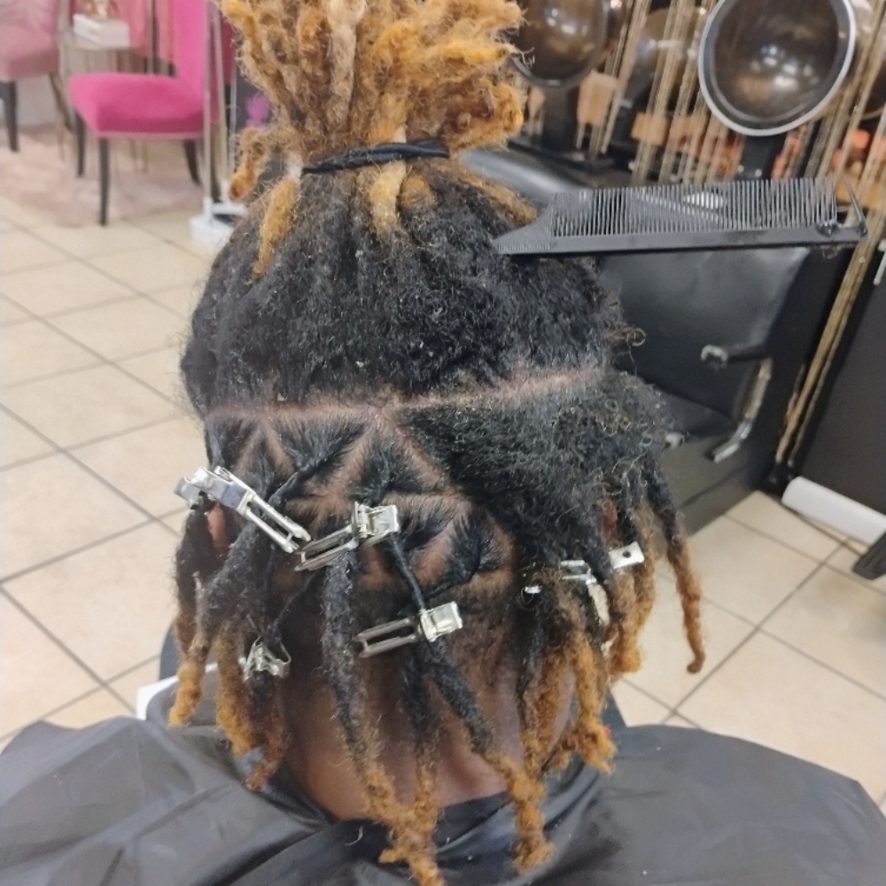 Locs Maintenance & Retwist at Shades Of Fee Beauty Boutique in Baltimore, MD