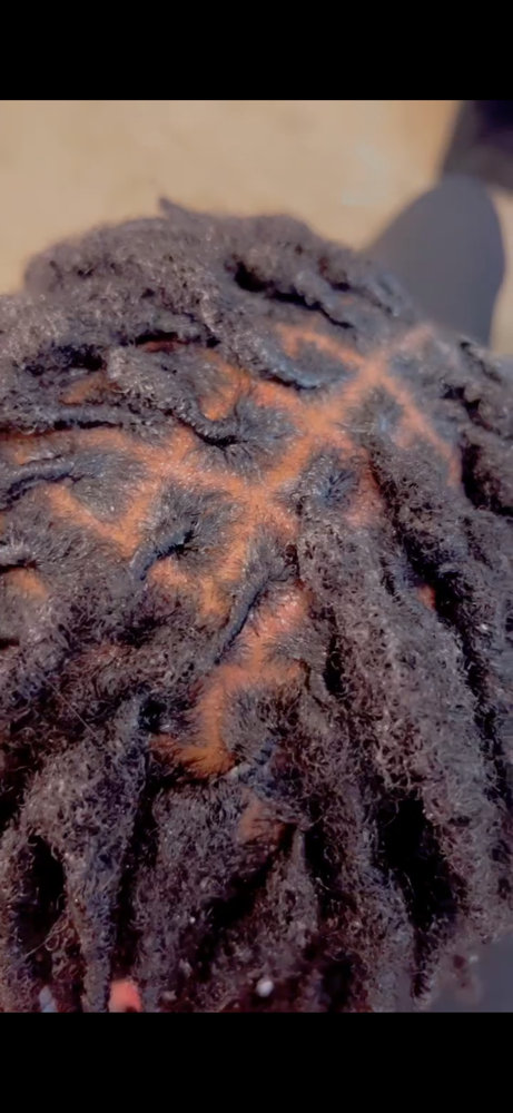 Loc Retwist (small) at Nays Beauty Parlor in Warrensbug, MO