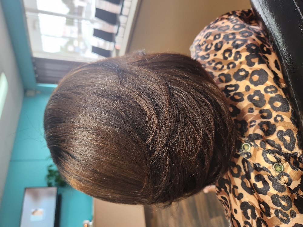 Relaxer at Eyes On You Beauty Salon LLC in Jacksonville, NC