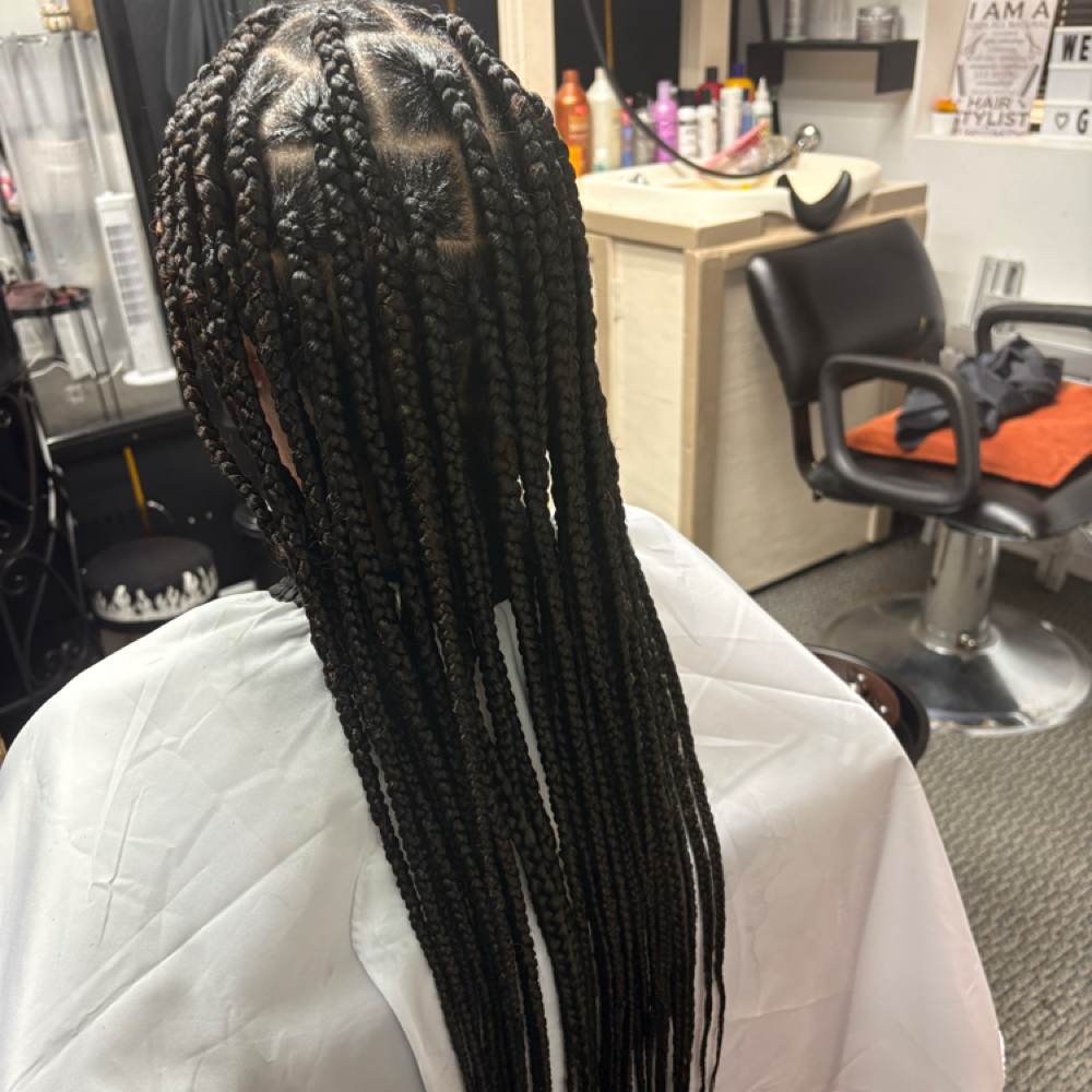 Medium Knotless Braids at Goddesss Hair Vault in Houston, TX