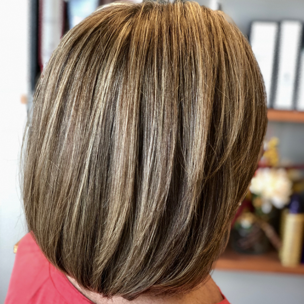 RETOUCH WITH FREE HAND at Blown Away Hair Lounge in Spring Hill, FL