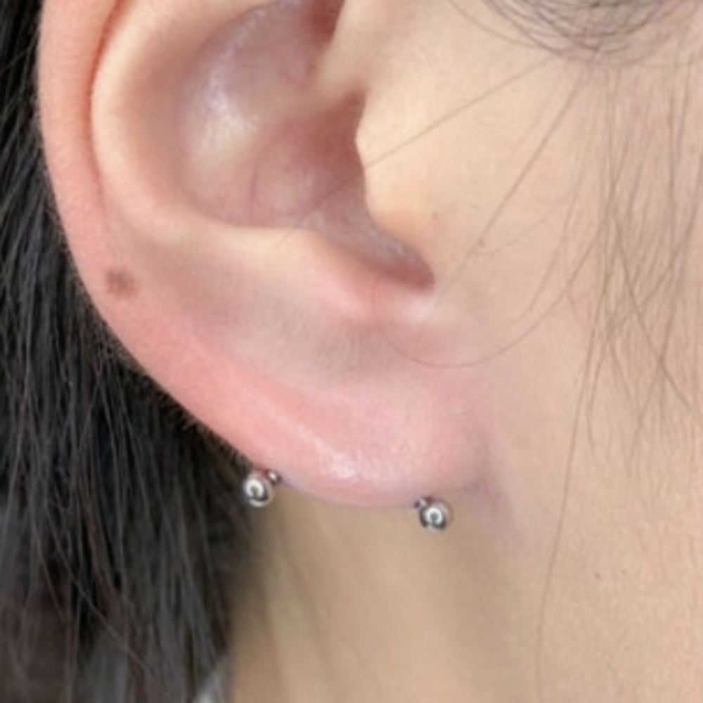 Transverse Earlobe Piercing at Spellbound Piercing in Dillon, MT