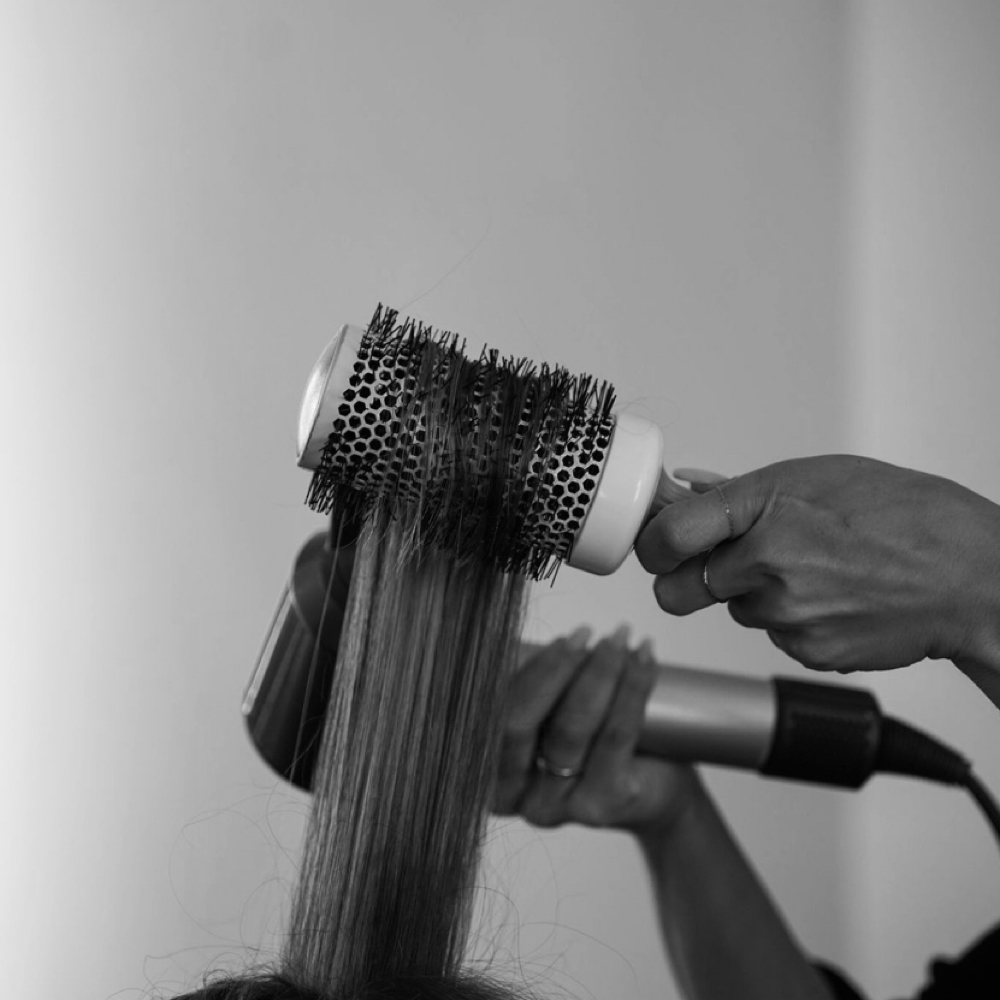 Shampoo + Blowdry Style at J West Salon and Spa in St. Louis, MO