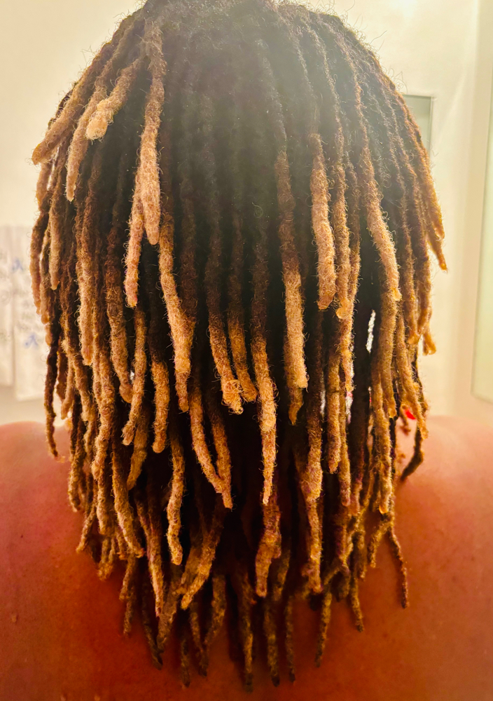 Retie Locs Beyond Shoulder Length at Faithful Beauti LLC in Orlando, FL