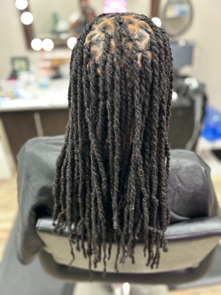 Loc Retwist & 2 Strand Twist at Ja’Tae Style Studio LLC in Euclid, OH