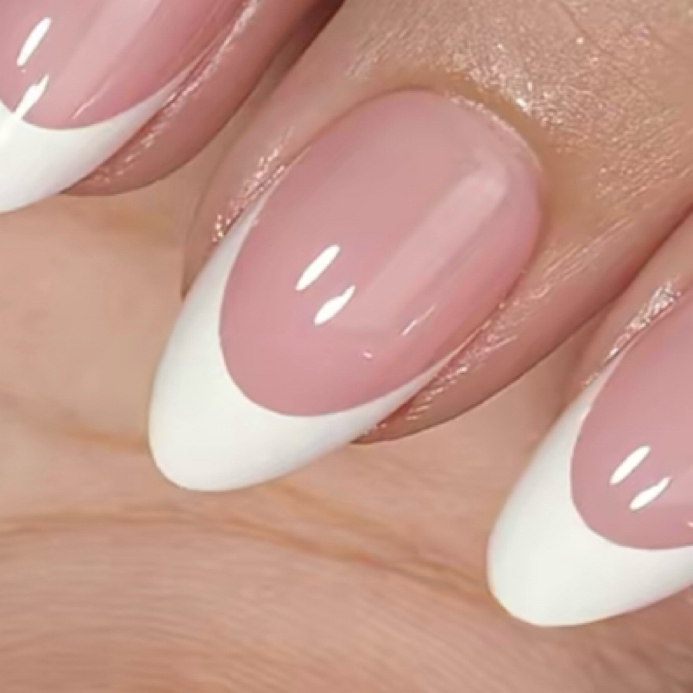 Express Nails Medium Almond French at Dreasnailvibes in Hayward, CA