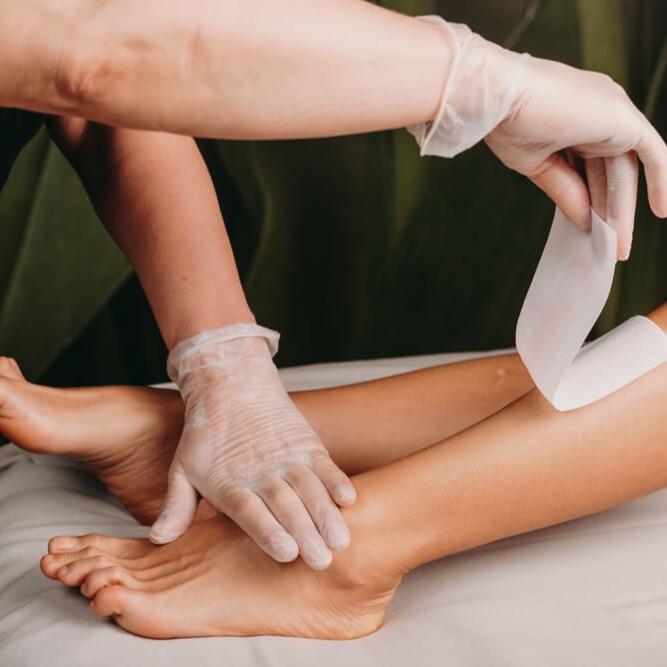 Half Leg Wax at Omnia Esthetics in Menomonie, WI