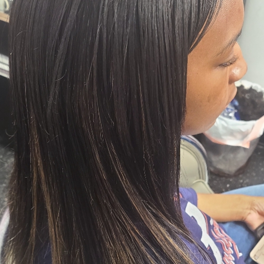 Sew-in Weave at Chon's Unique House of Hair in Detroit, MI