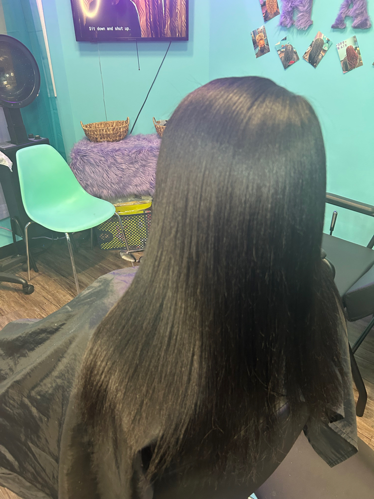 Silk Press at Thahairtherapist in Houston, TX