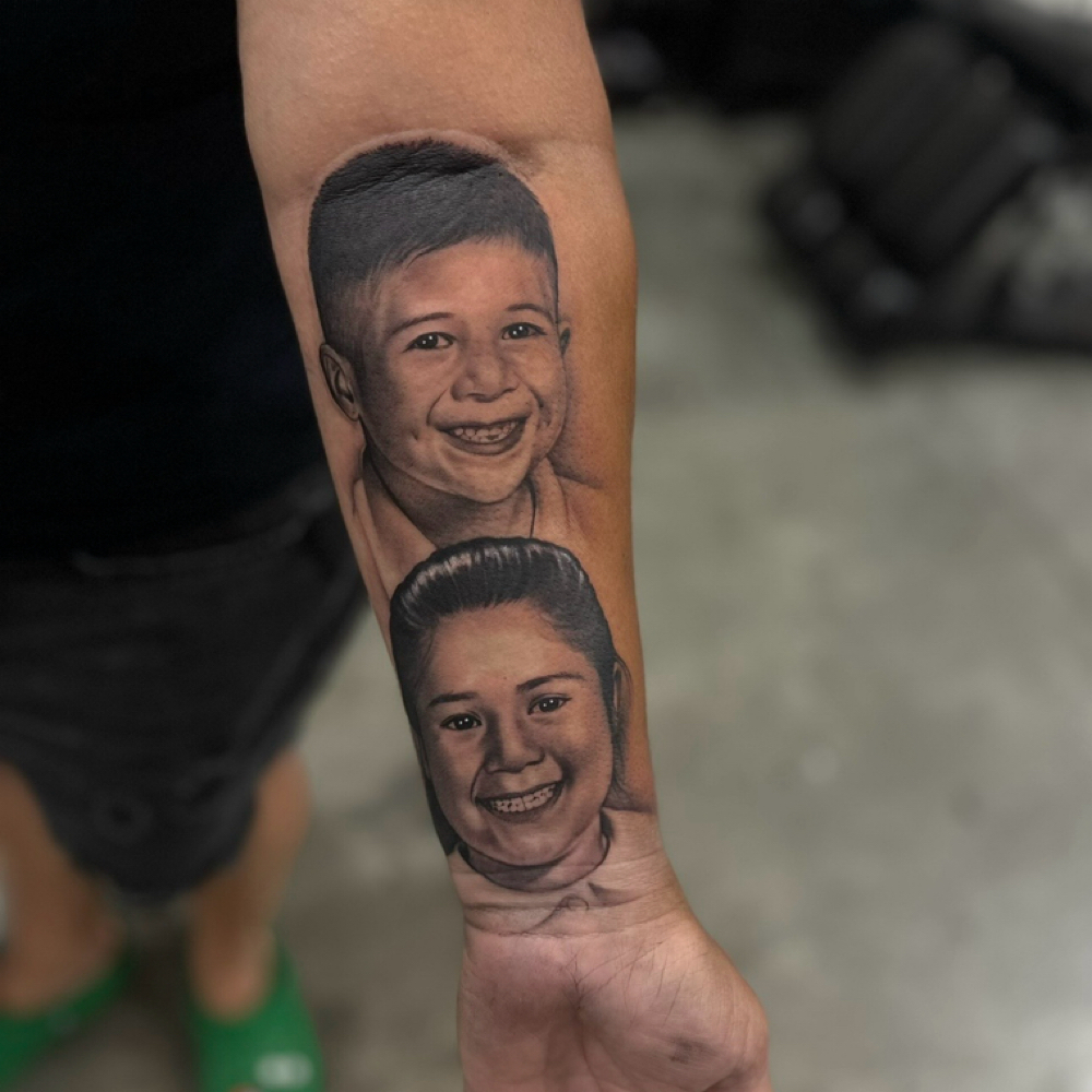 Double Portraits Forearm at Revision Body Art in Covina, CA