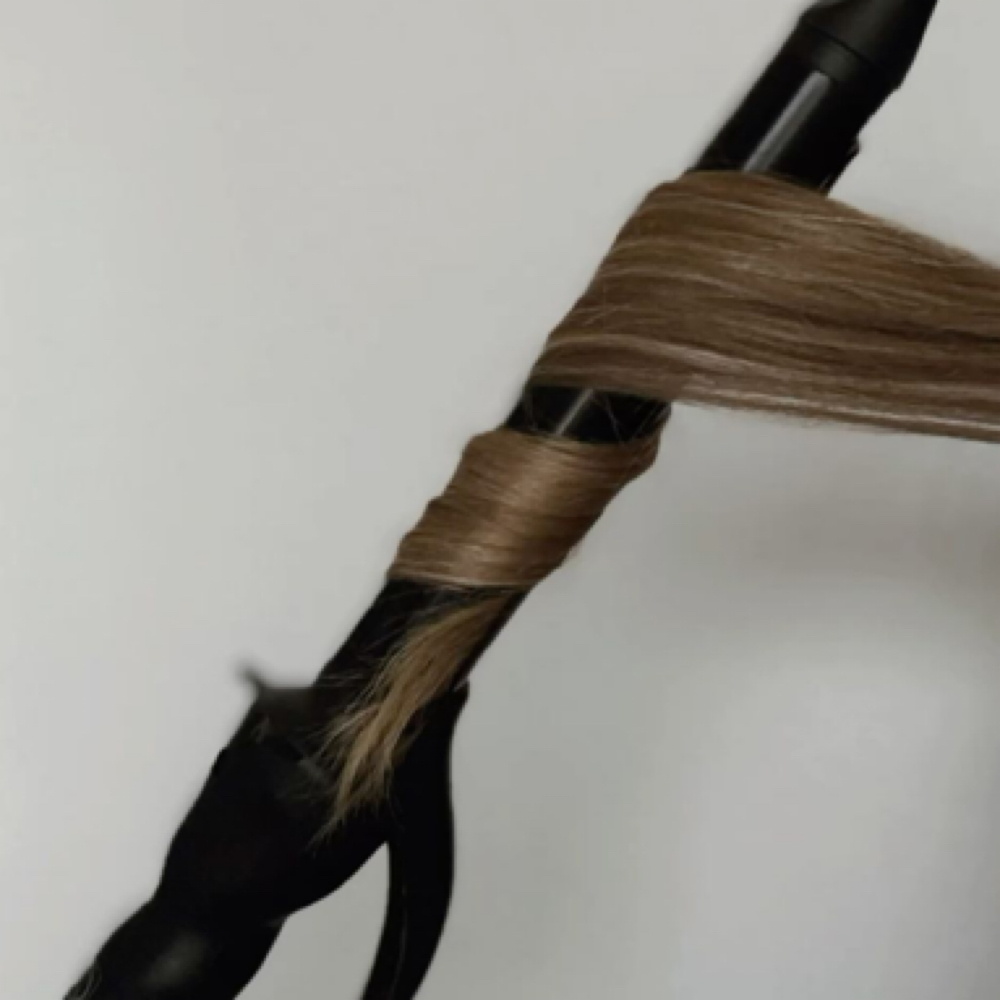 Curl/ Flat Iorn at Isabella’s Spa in Gilmer, TX