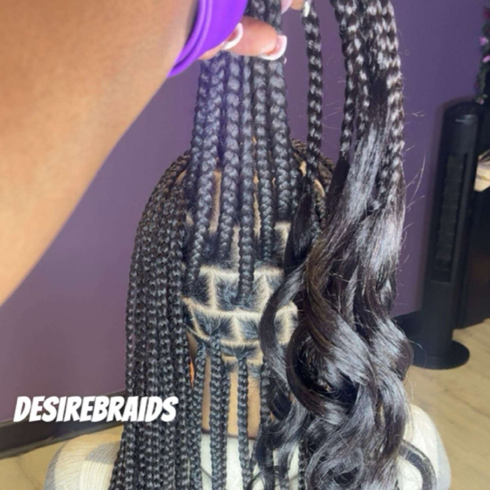 18” Medium French Curl Knotless at Desire Braids in Wichita, KS