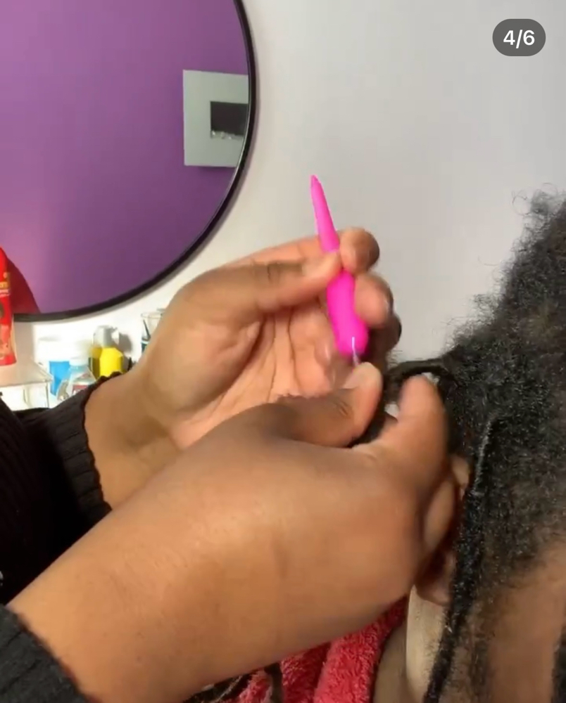 Whole Head Loc Restoration/ Retwist at Lee The Hair Magician LLC in Detroit, MI