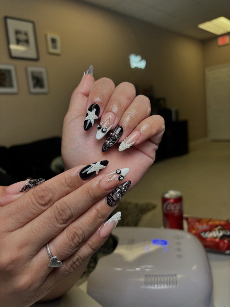 Long Acrylic Nail Set at Emerald pearl in Crystal City, TX