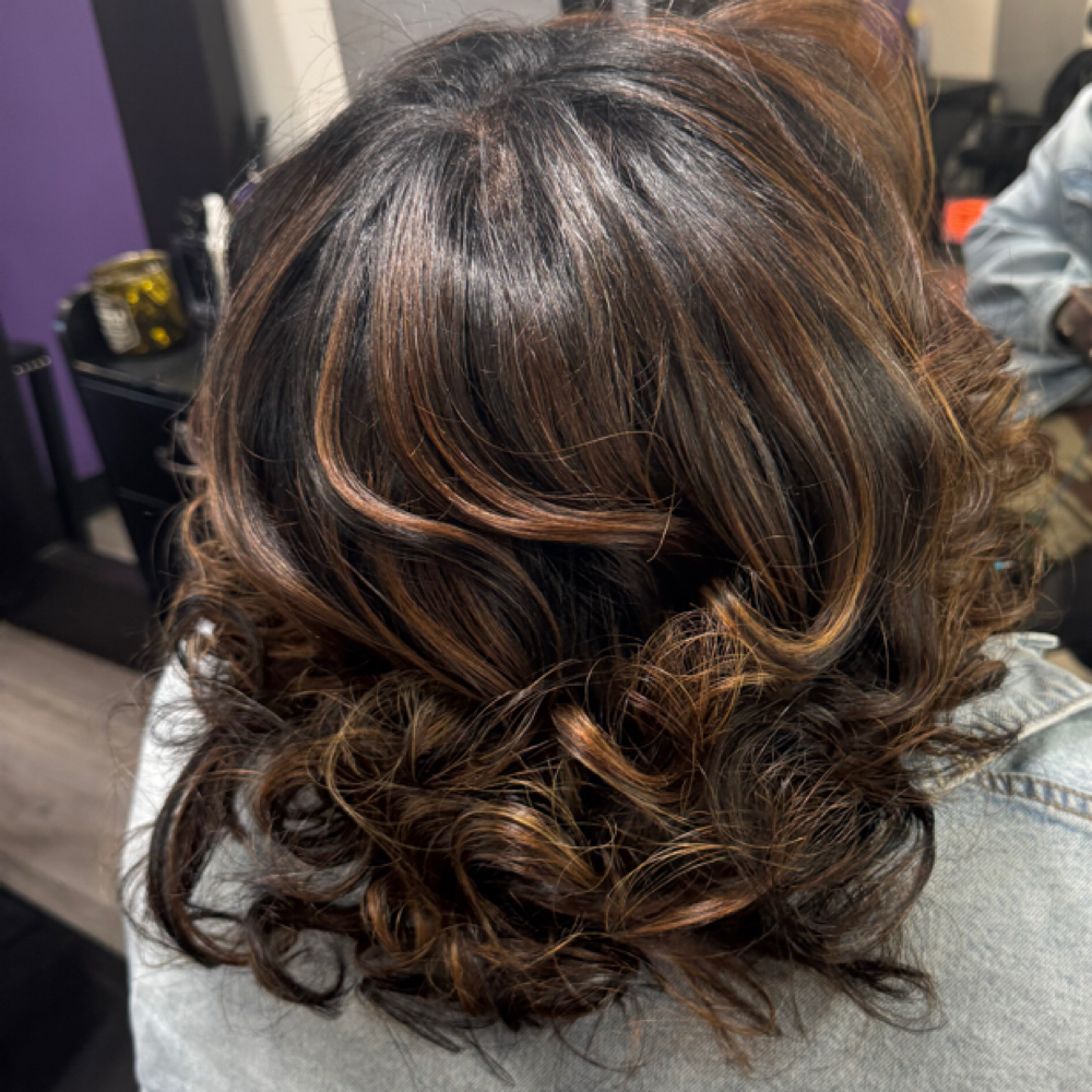 Special: Shampoo, Press & Trim at Touches by Tircuit - The Hair Studio in New Orleans, LA