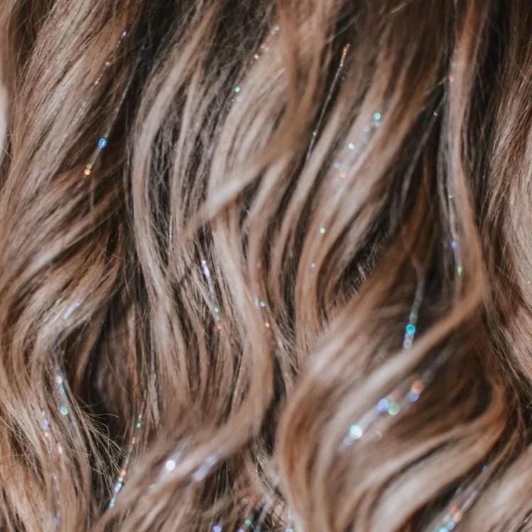 Hair Tinsel per bead (2-4 strands) at Honey & Comb Hair Studio in Venice, FL