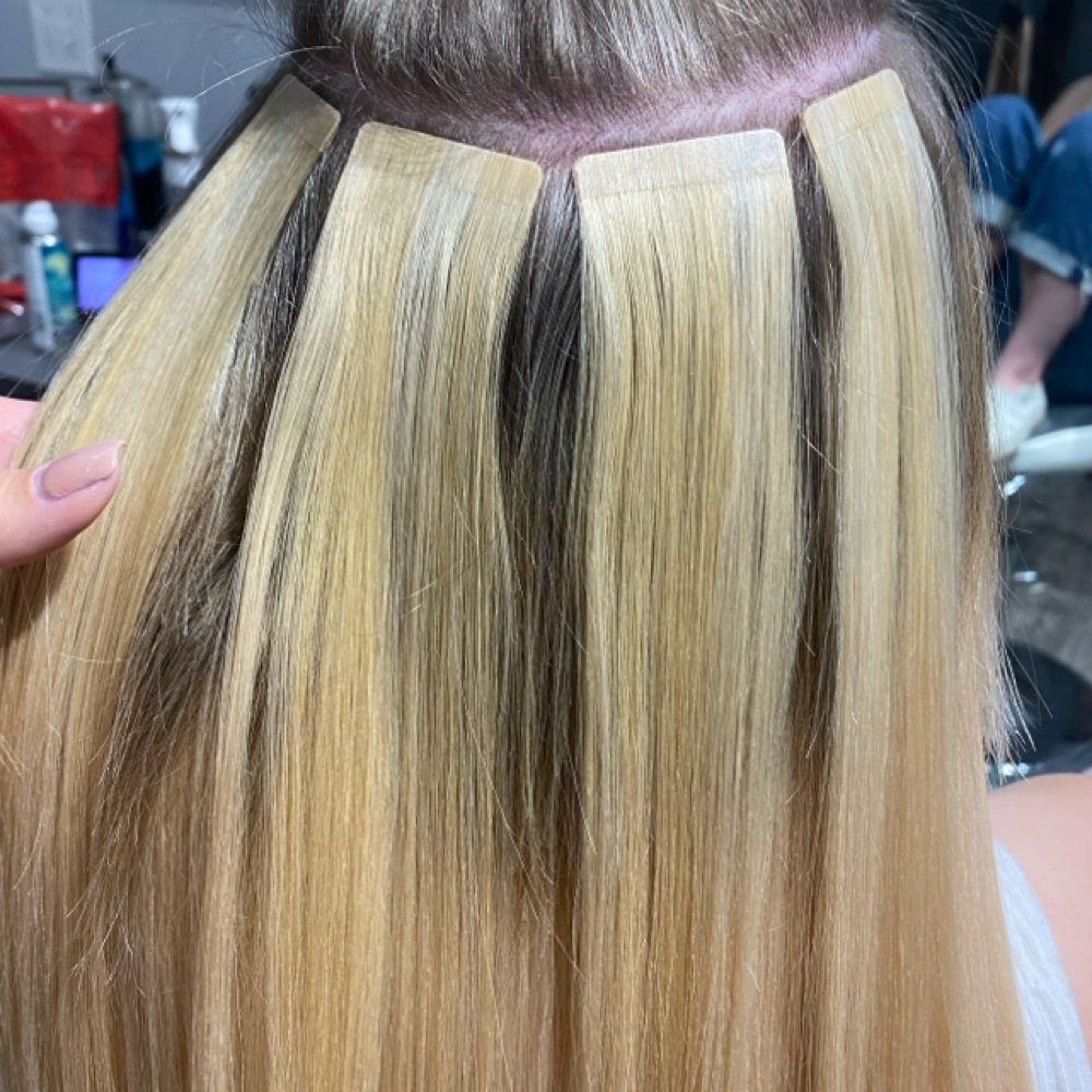Tape Reapplication at Lindsey Ellen Beauty in Warrenville, IL