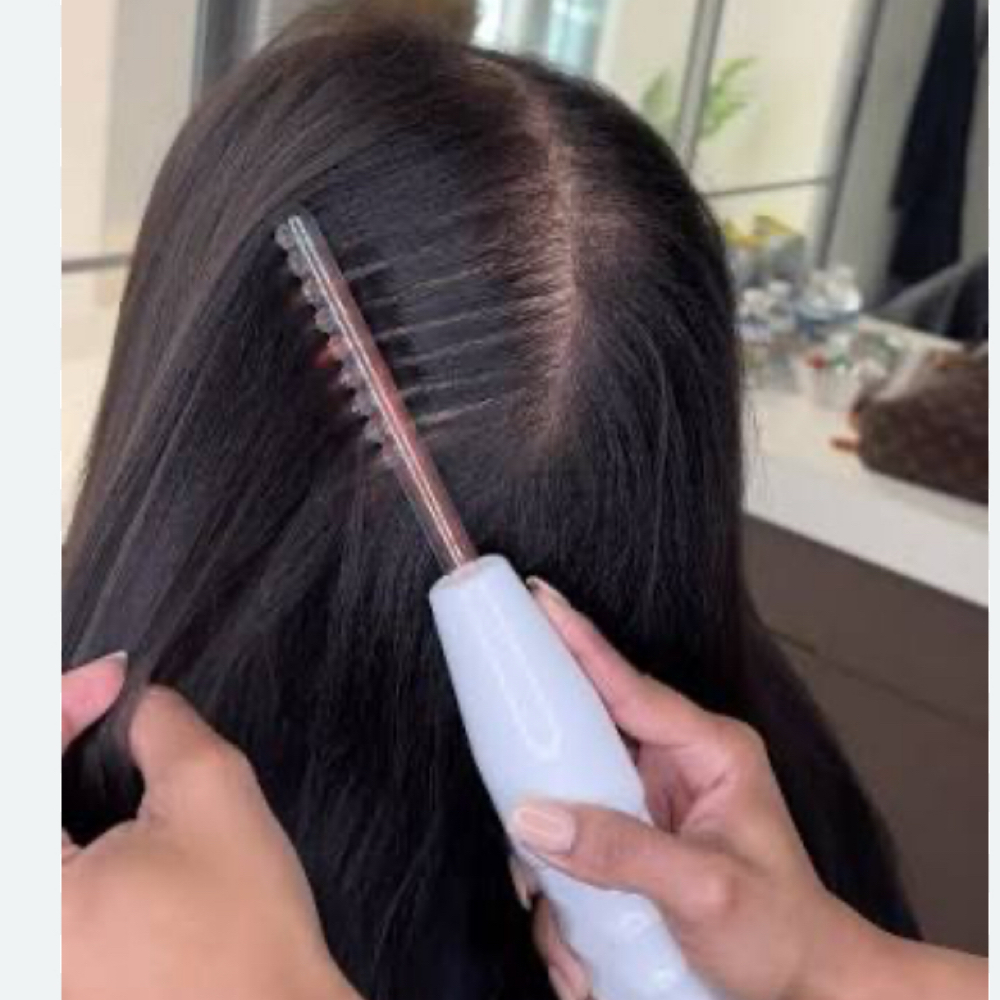 Scalp massage high frequency therap at Devi Studio in Surprise, AZ