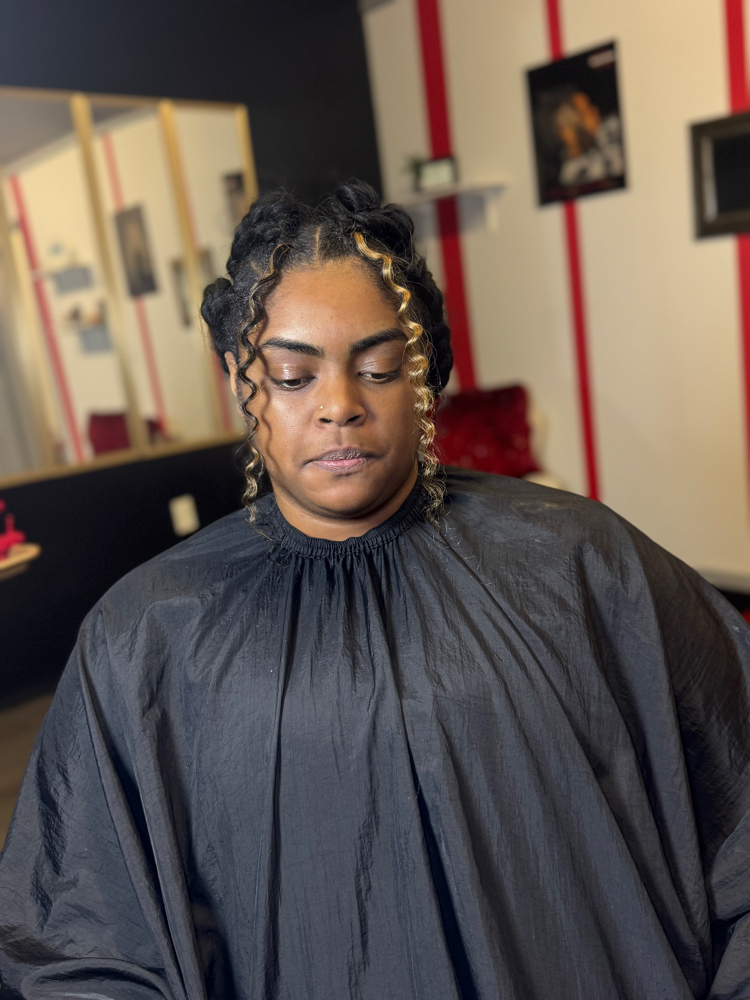 Butterfly braids W Hair at The Crochet Lounge in Charlotte, NC