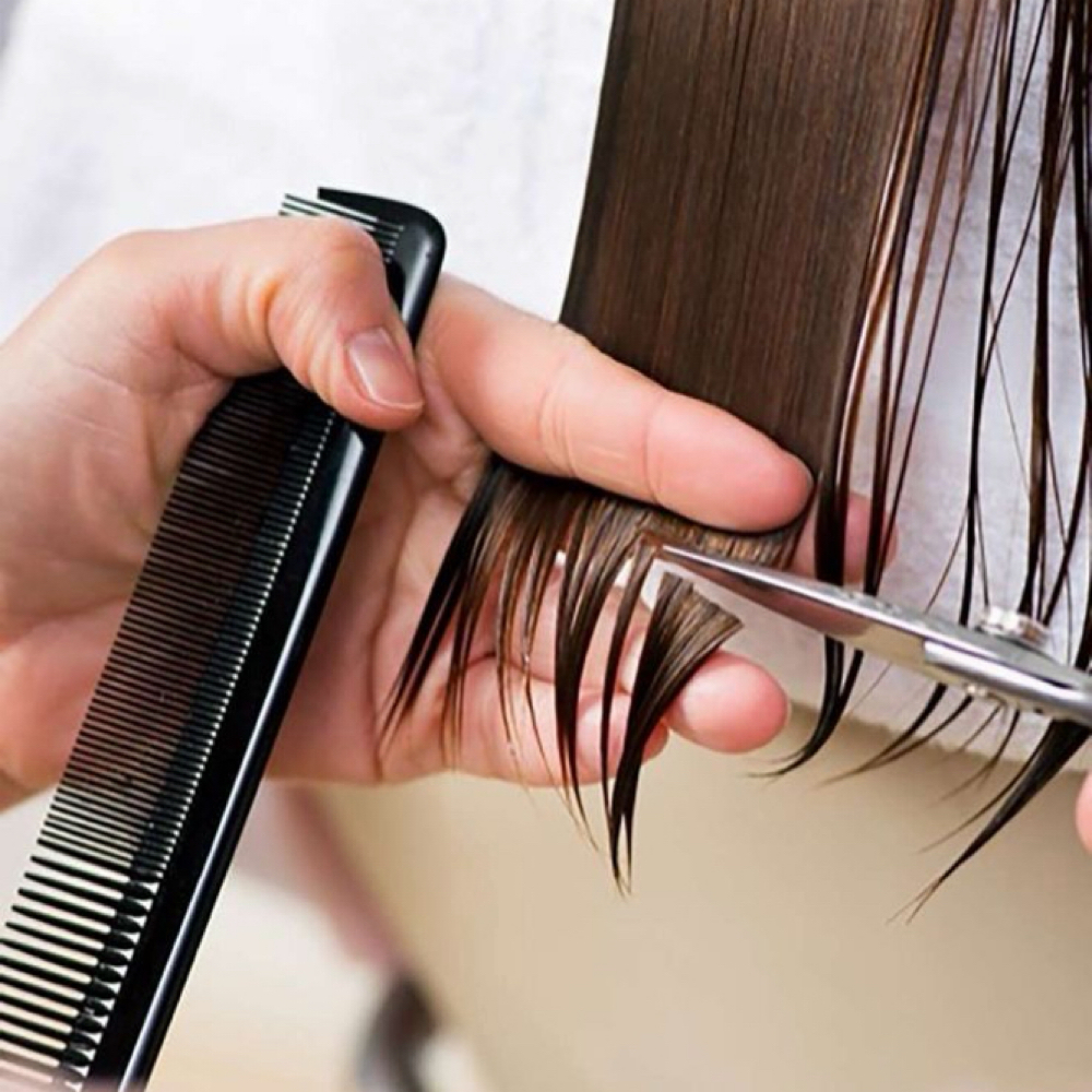 Kids Haircut (12 and under) at Beauty Empire Salon in Raymore, MO