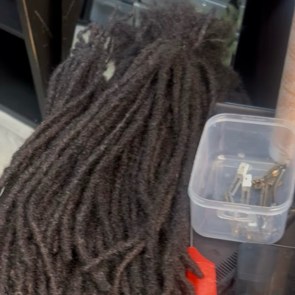 Loc Reattchment/ Reconstruction at Nubian Creations LLC in Charlotte, NC