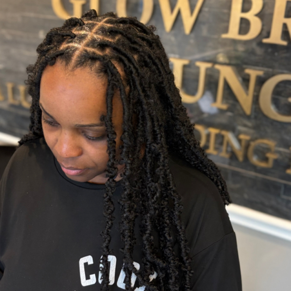 Butterfly locs at Glow Braid Lounge in Pearland, TX