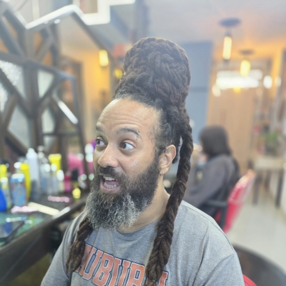 Loc Retwist + Simple Style at Knotty Opulence Hair Care Studio in Merida, TX