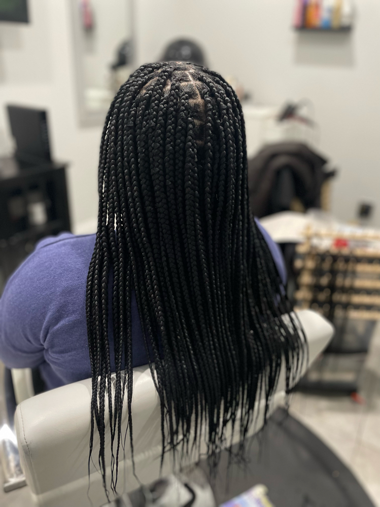 Knotless Braids: A Revolution in Braided Wig Styling - Bounce Magazine