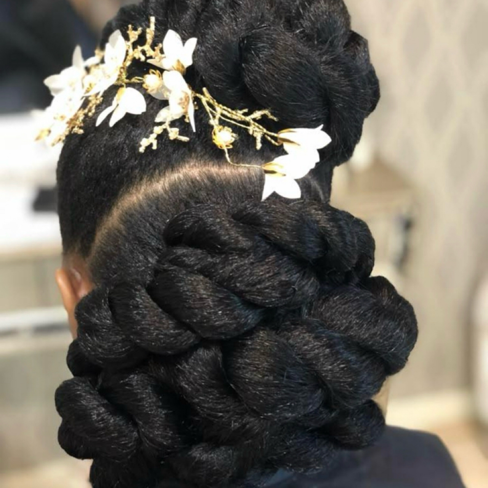 Signature Twist Updo (added hair) at SophistaCurlz Hair Restoration Clinic in Columbia, SC