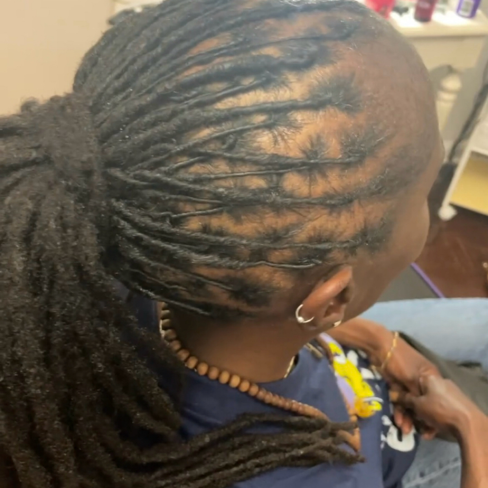 Loc Retwist at Simply Beautiful Hair Care in Lithonia, GA