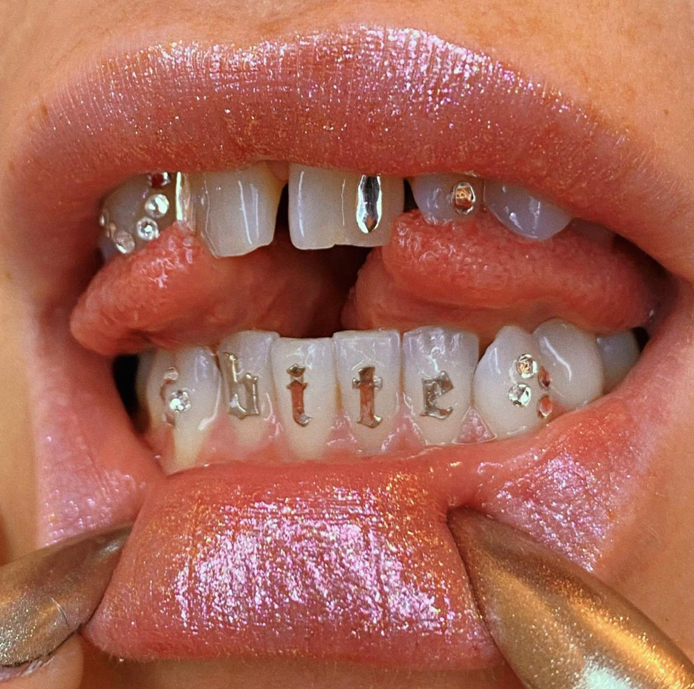 18-24k Gold Tooth Charm