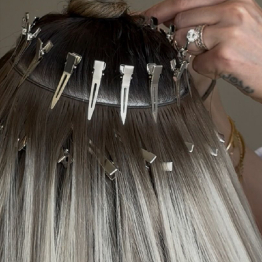 Two Rows Sew In Extension Move Up- at The Butterfly Loft in Fenton, MI