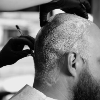Head shave at Melrose Barber Lounge in Carson City, NV