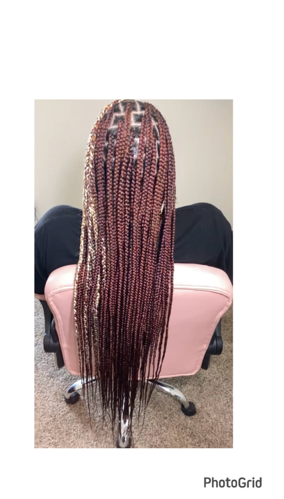 medium knotless (thigh length) at loc’d&braided in Dayton, OH