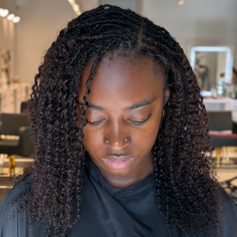 Custom Goddess locs and Reconstruct at EI-ECO in Las Vegas, NV