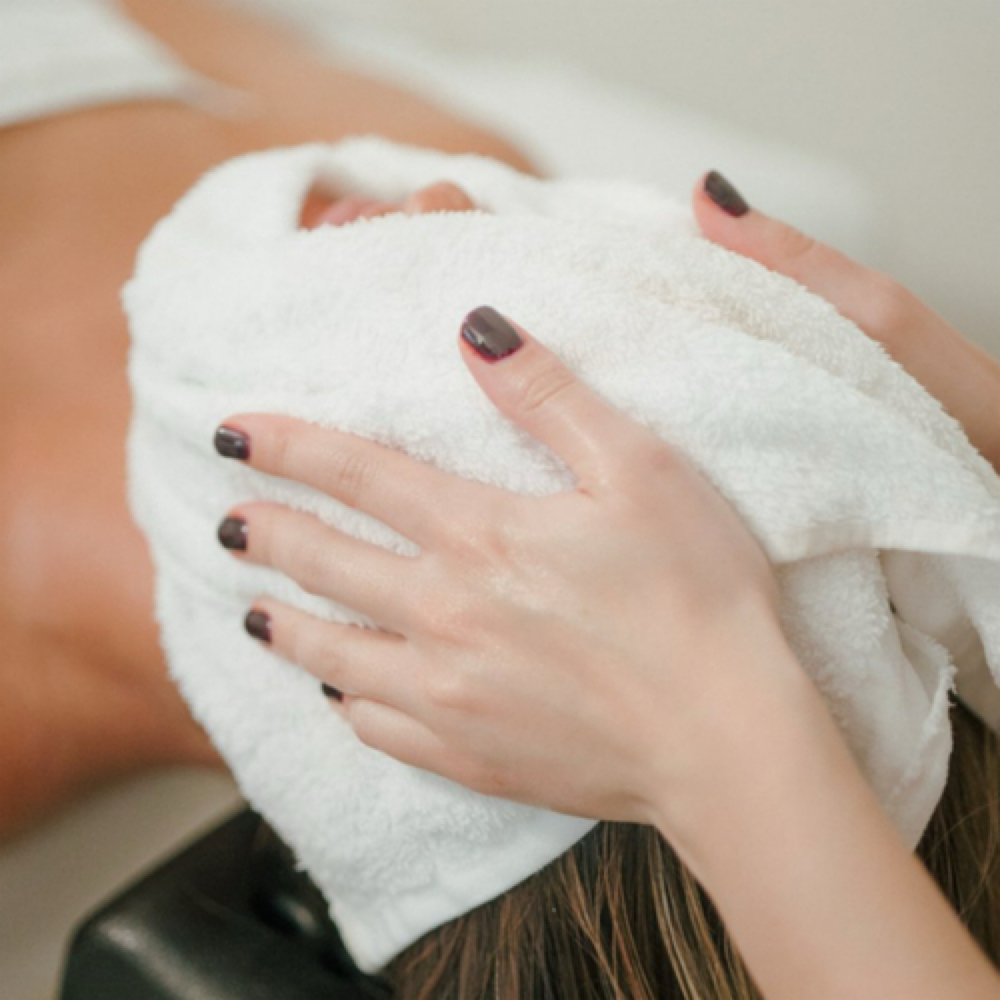 Add on a Heated towel therapy at Luxia Head Spa in Winter Park, FL