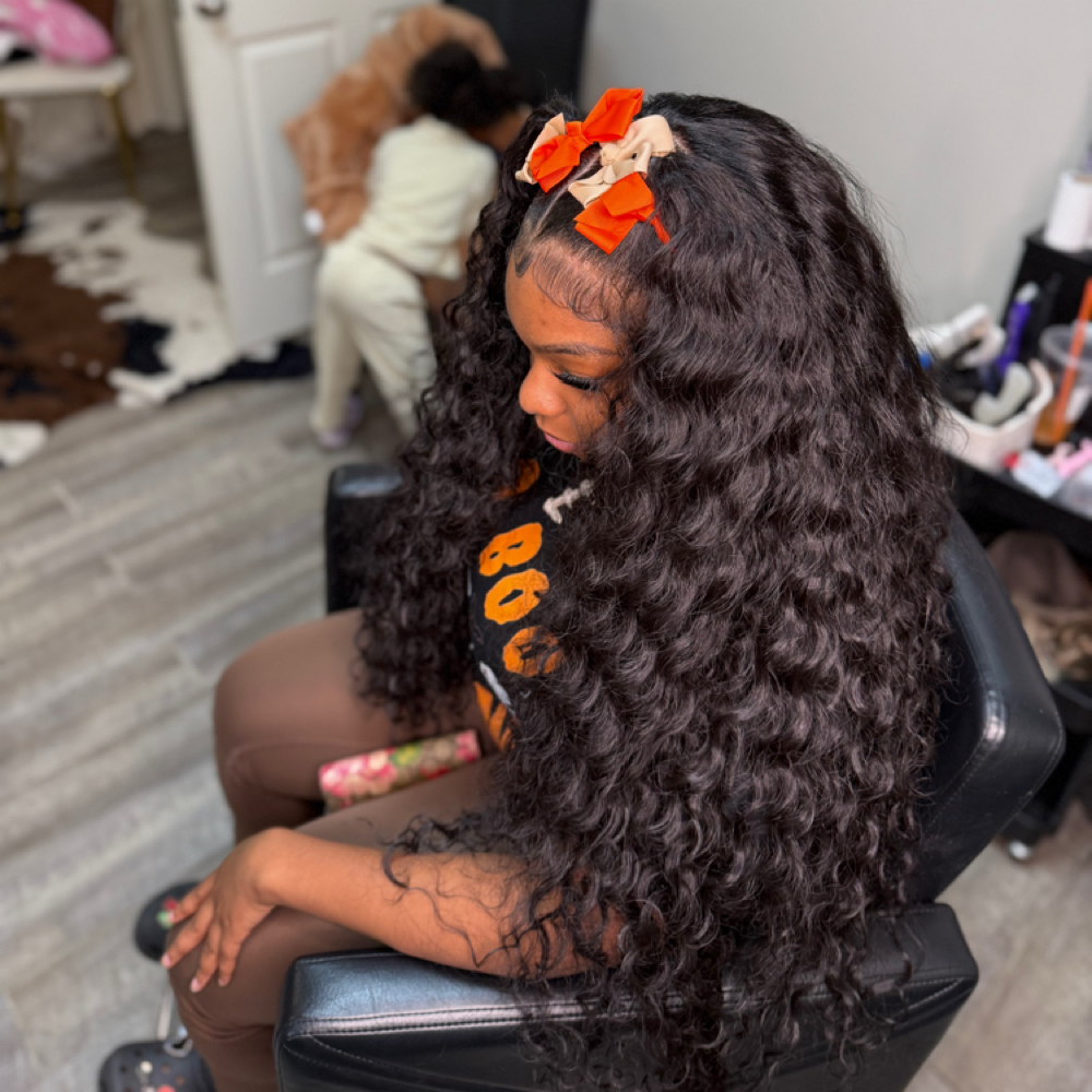 Half Up / Half Down Quick Weave at Faith TheBraider in Milwaukee, WI