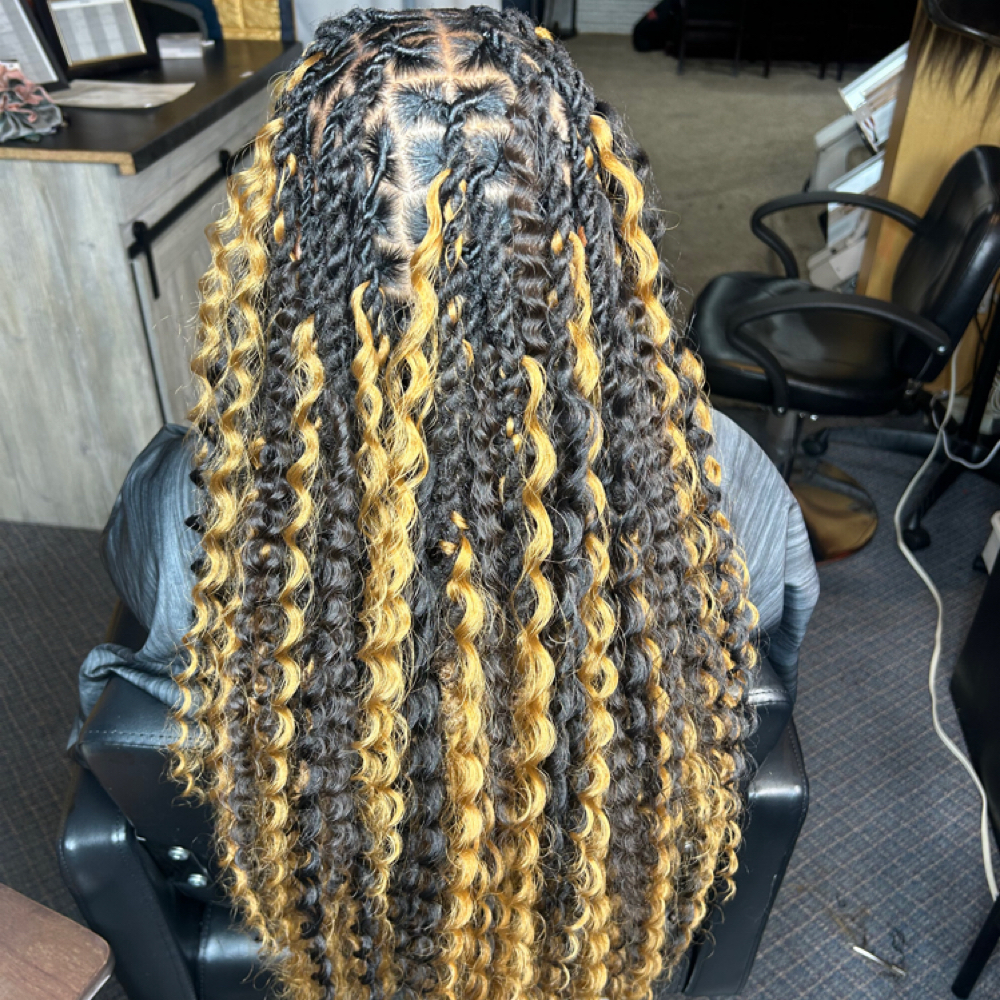 Two Strand Twist With Boho at Locs O’ Luv by Nola in Bloomington, IL