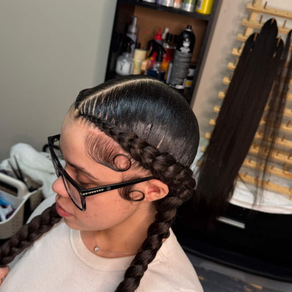 Two Feed In Braids at Faith TheBraider in Milwaukee, WI