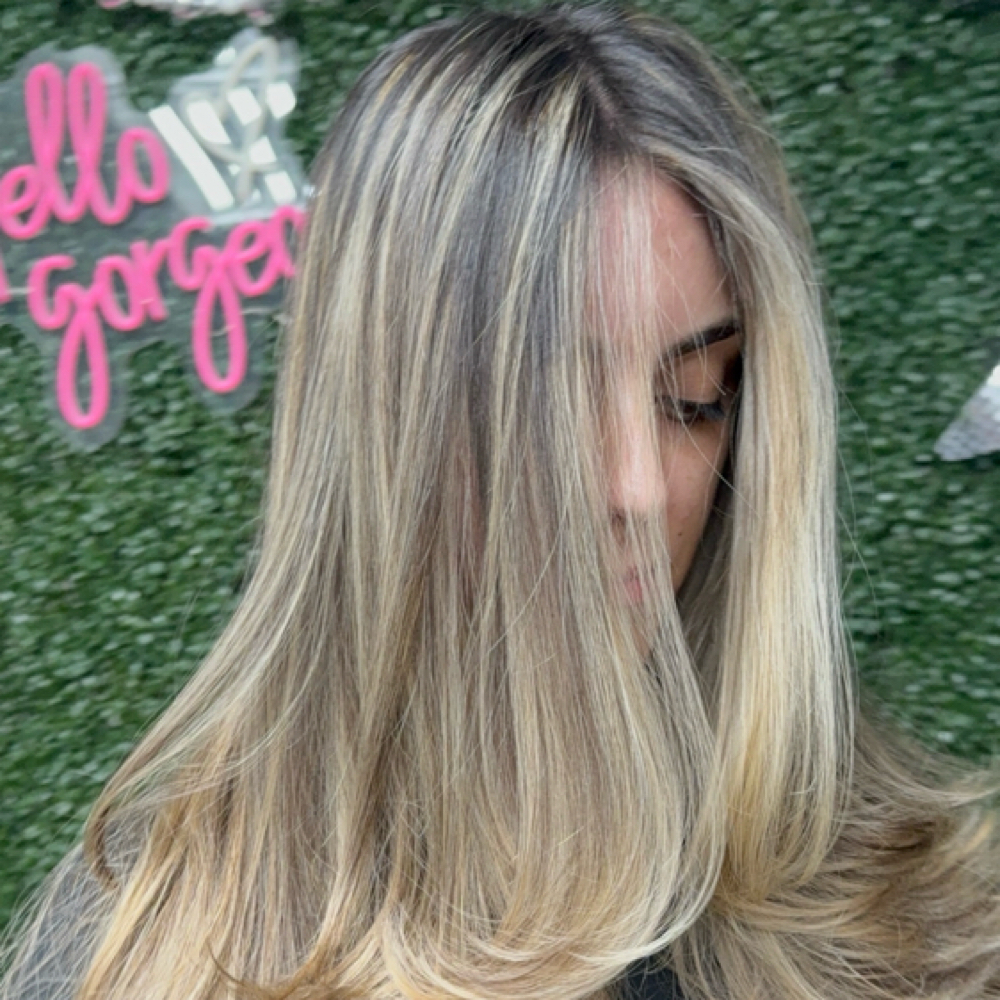 Blowout with hair extensions at Hairbyfendi in Brooklyn, NY