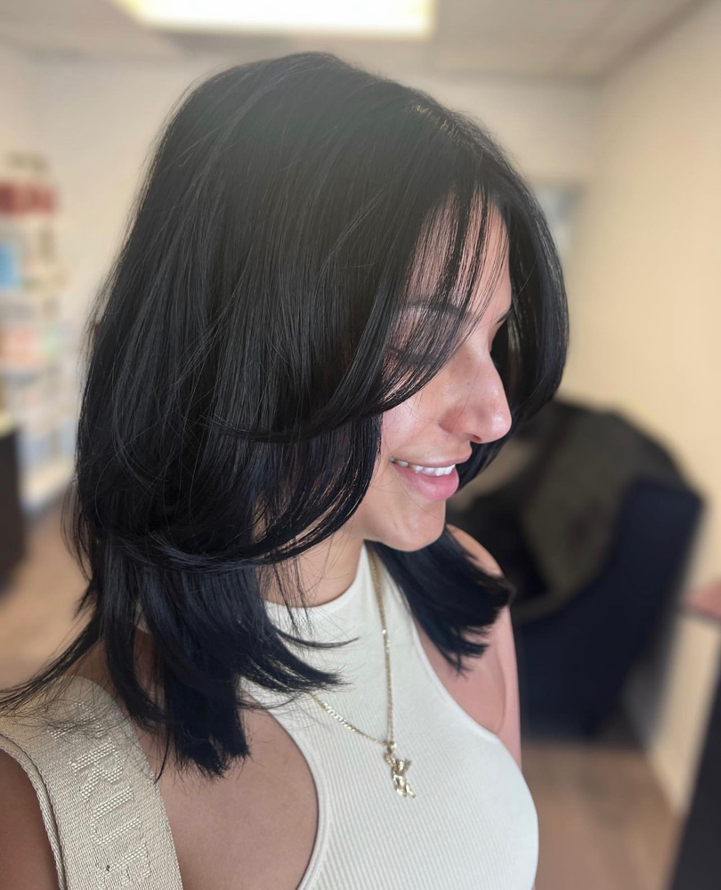 Woman’s haircut & Blowdry