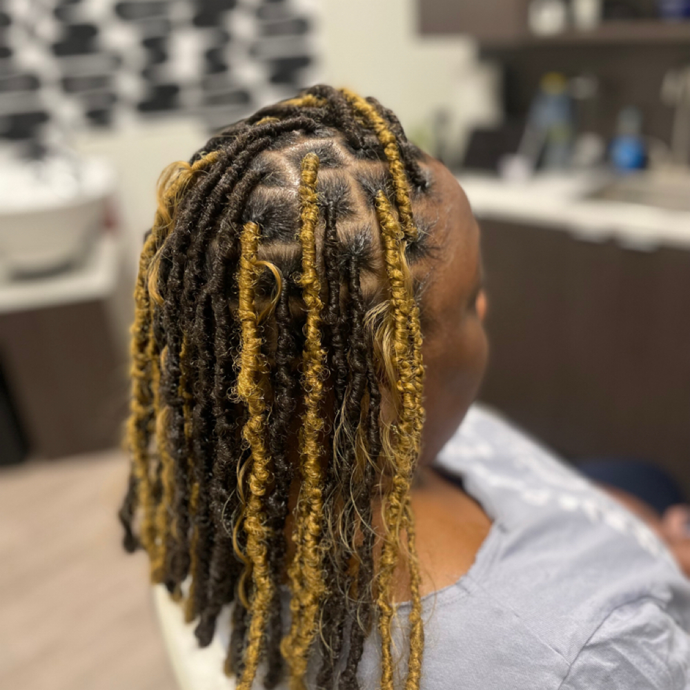 Distressed locs blunt ends at Ronniejay Collection in Harrisburg, PA