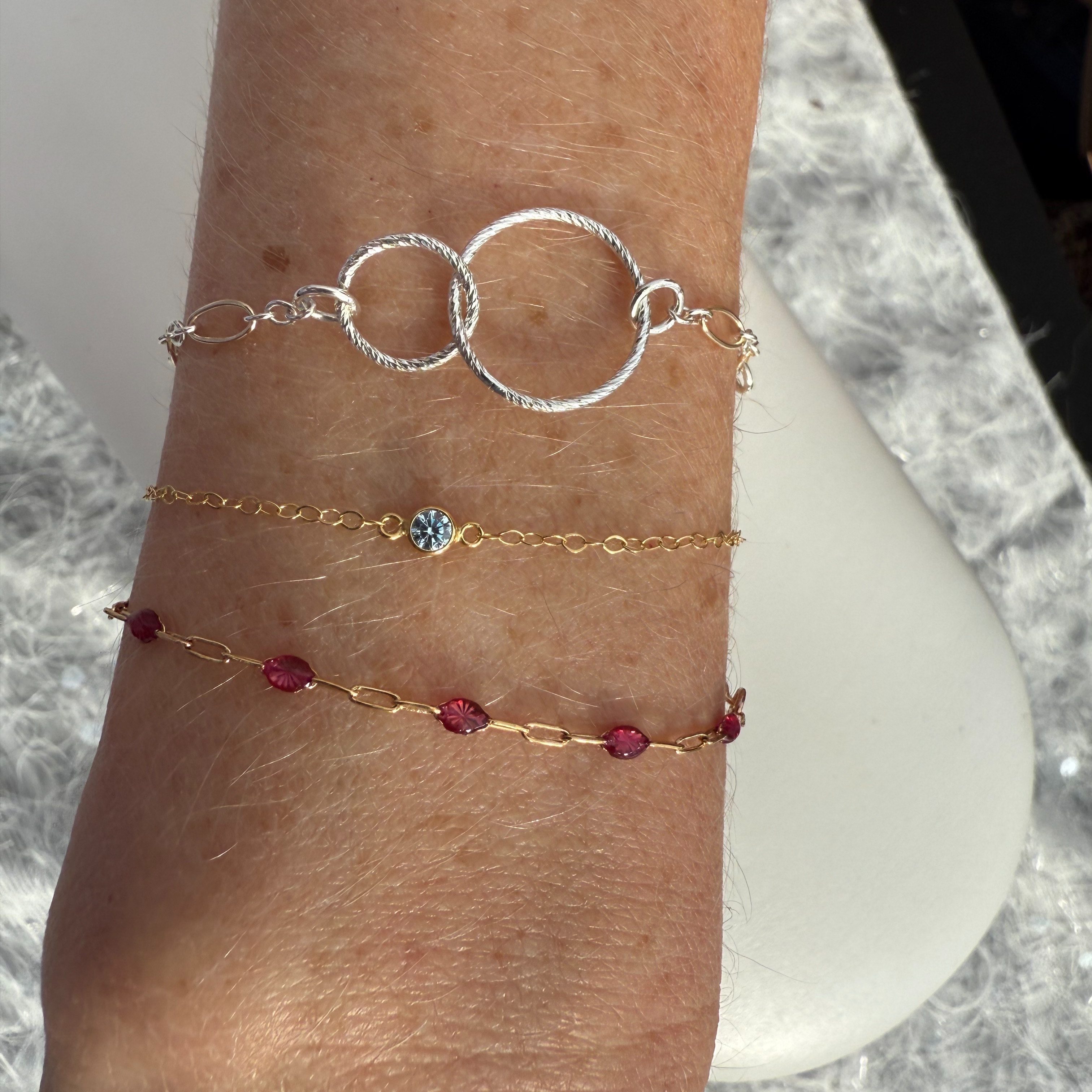 Stack Of Bracelets-Sterling Silver at Calm Creations Permanent Jewelry in Erie, PA