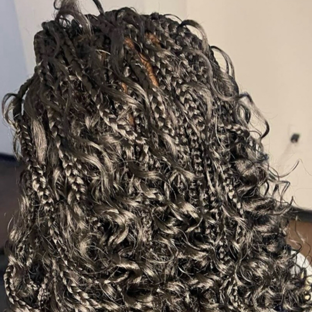 Meduim boho knotless Waist Length at Yunis hair braiding in Belleville, MI