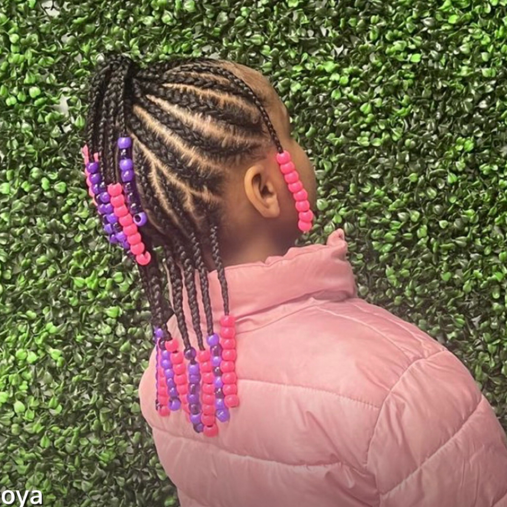 Beads Added To A Style at The Oasis Natural Hair Salon in Gibsonville, NC