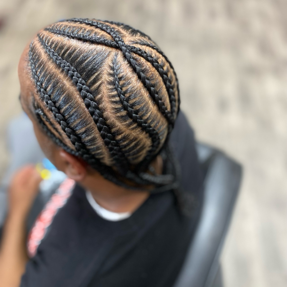 Men Design Braids at Crowned Braids Salon in Conway, SC