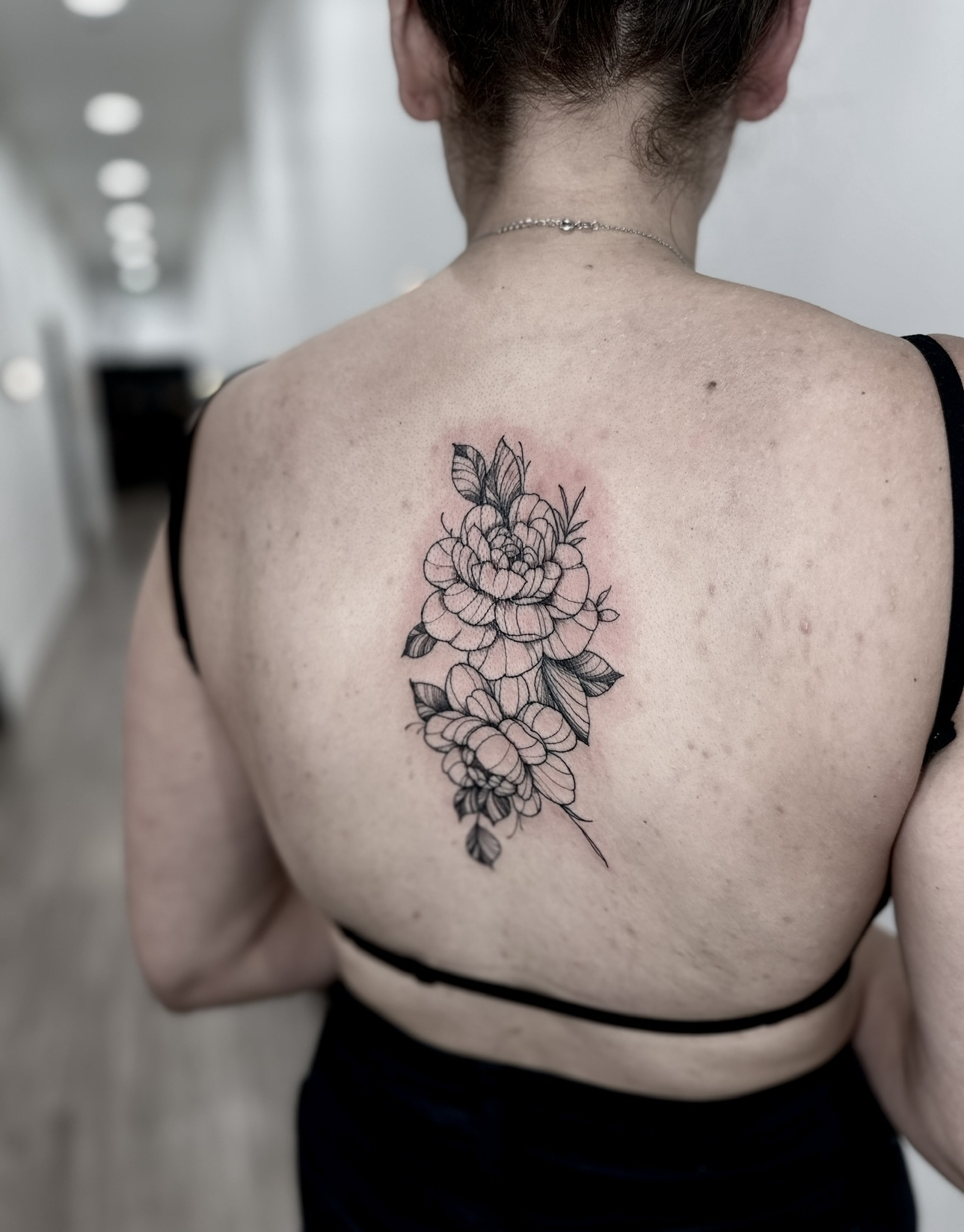 Minimal Floral Back Tattoo