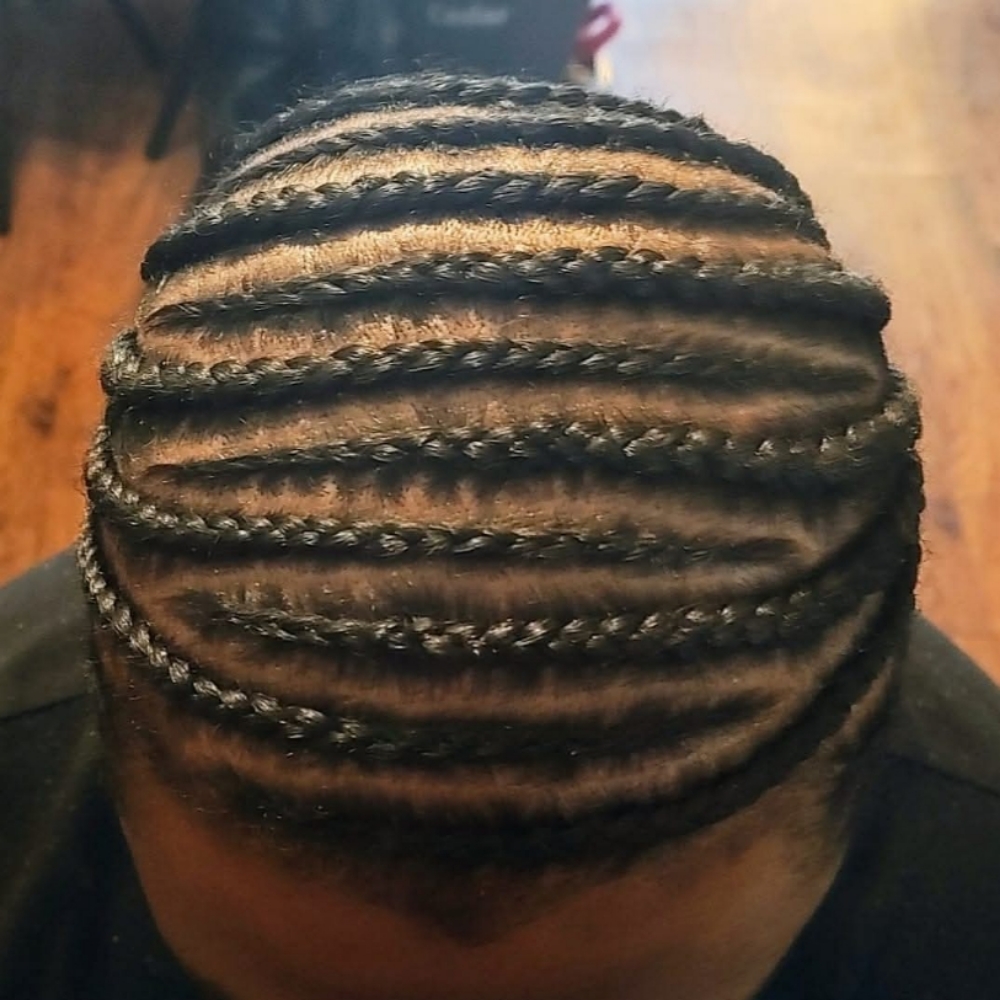 Cornrows at Smiles & Styles in Sioux City, IA