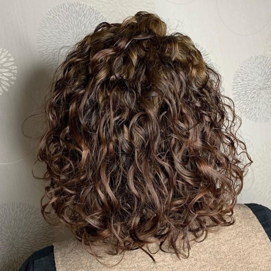 Shoulder Length Curl PERM at Goddess of Balayage located inside Wesley Slay Salon in Las Vegas, NV